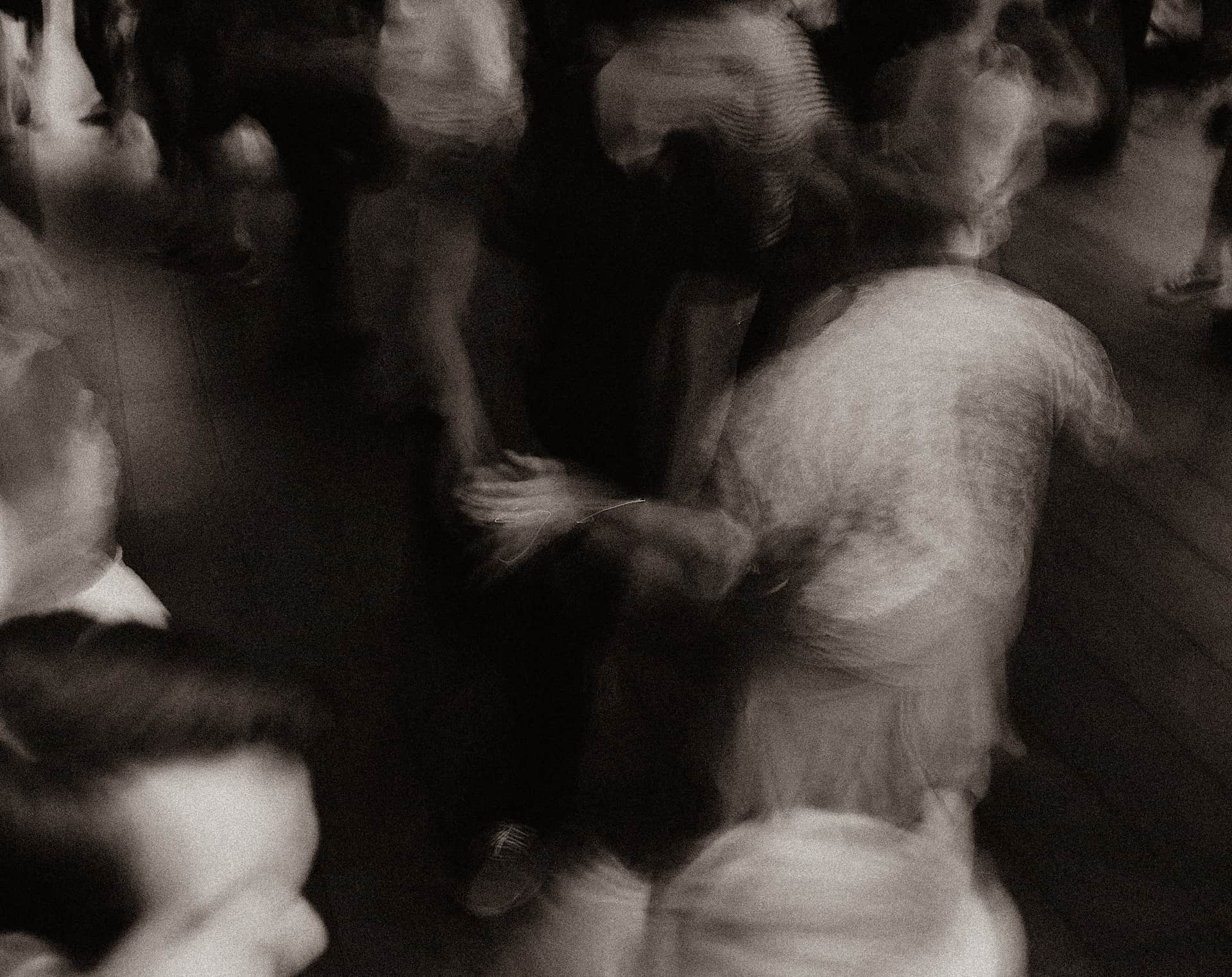 A dance floor seen from the booth, in black and white