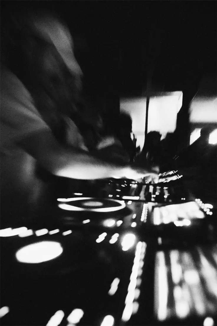 A DJ booth under the lights